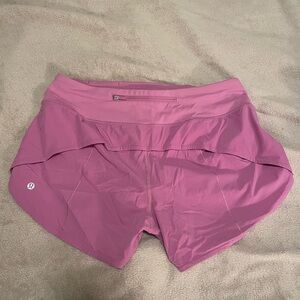Pink regular rise lululemon shorts